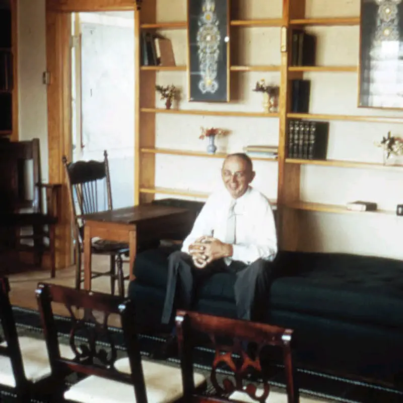 Edgar Cayce sitting on couch