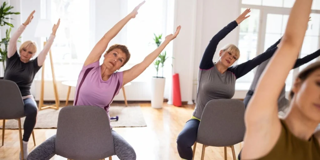 Take a Seat! Exploring the Benefits of Chair Yoga at AREÖM Studio